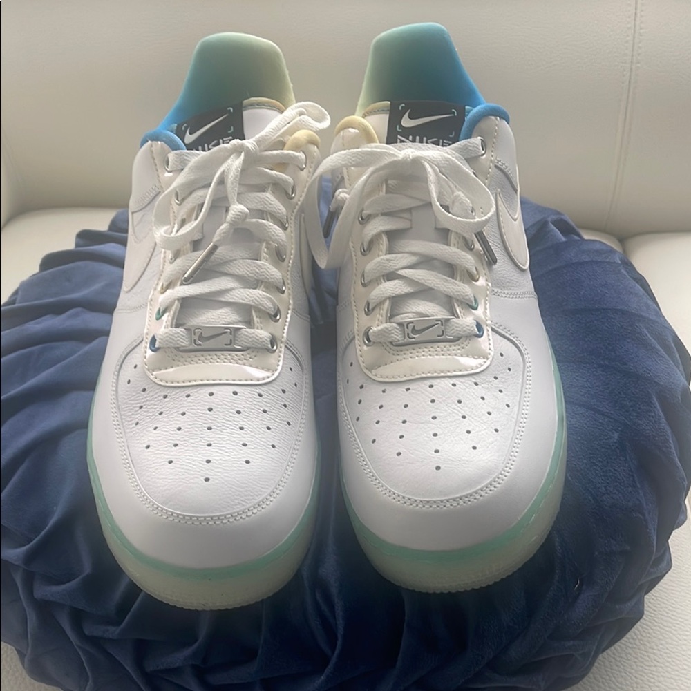 Nike White Sneakers with Blue and Green Accents